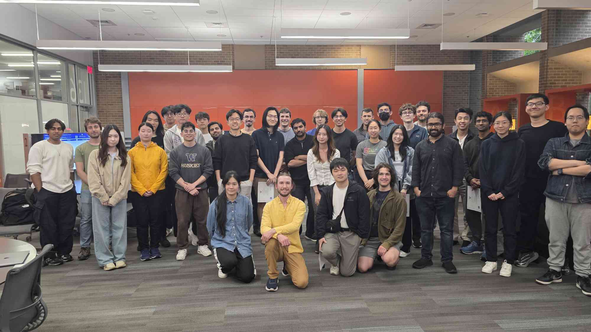Math AI Lab members and project teams standing together at Spring 2026 demo day